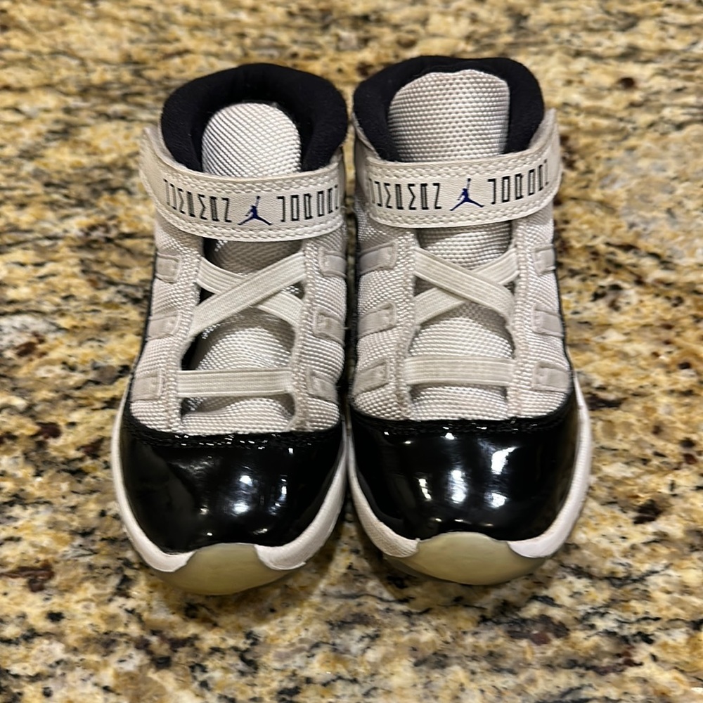 Toddler’s white/black Jordan size 10.